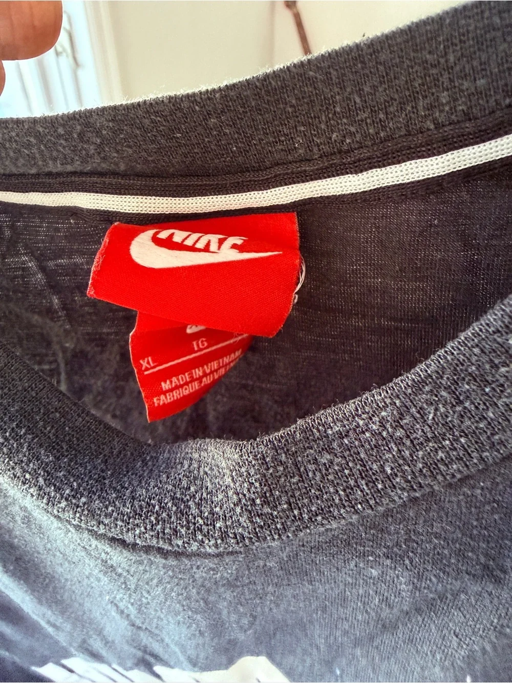 Nike Black Muscle Tank with White Swoosh Logo